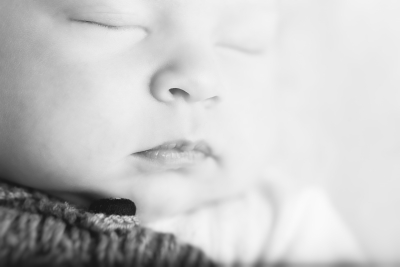 Closeup of a newborns face, sleeping, taken by Kimberly Kendall of Fort Wainwright, Alaska