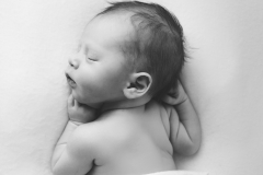 Sleeping newborn in black and white taken by Kimberly Kendall Photography at Fort Wainwright, Alaska